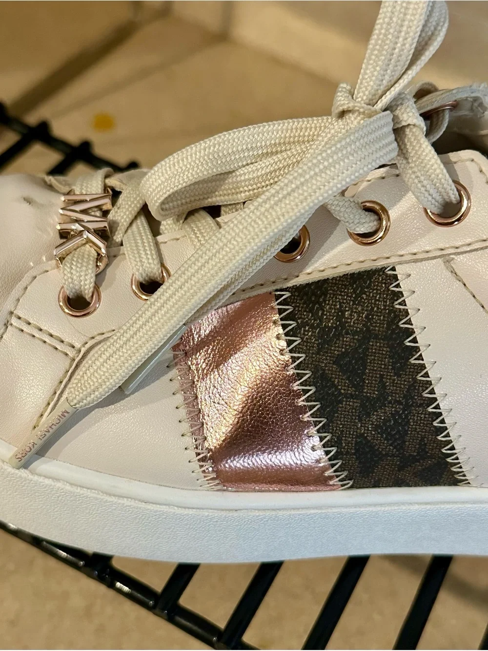 Michael Kors cream leather sneakers
